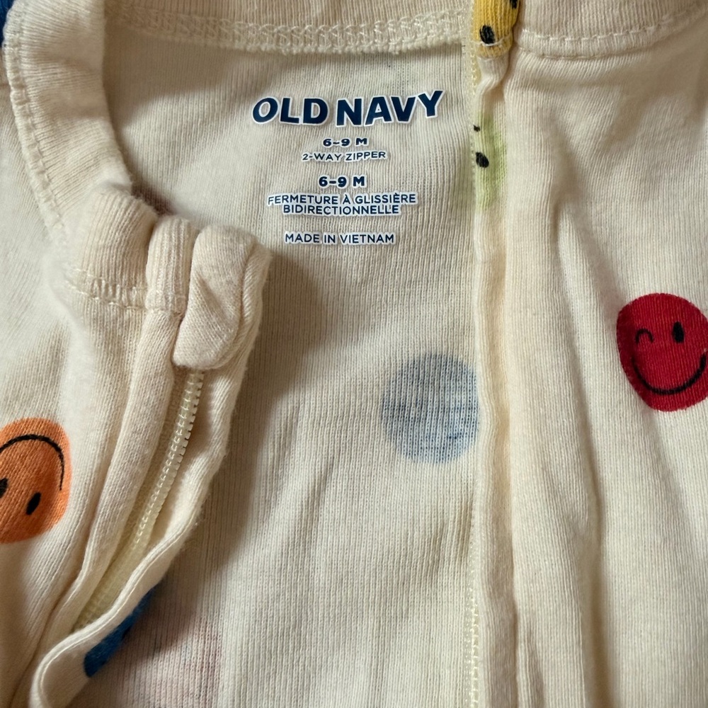 Old Navy Cream Smiley Face Footed One-Piece - Picture 2 of 5